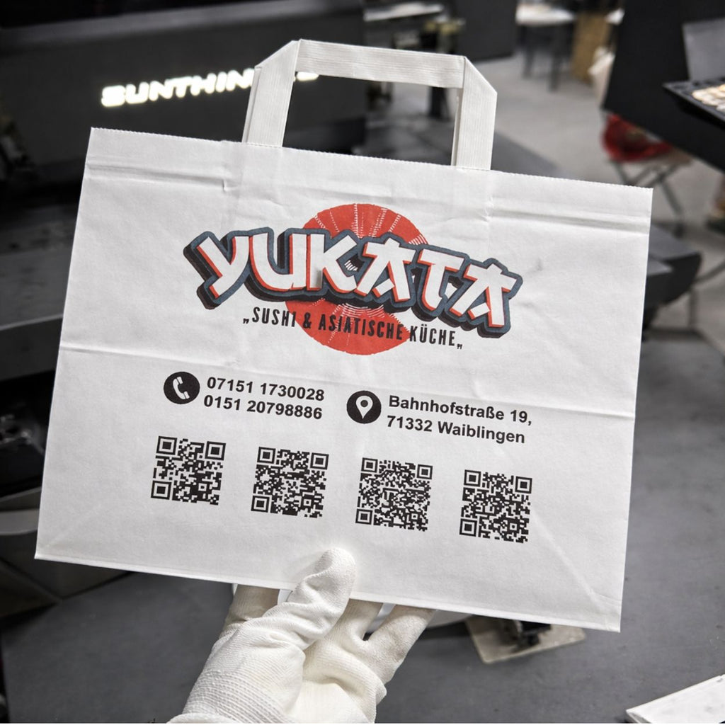 Papírová taška bílá, ploché ucho, 320 x 220 x 240 – detail potisku CMYK